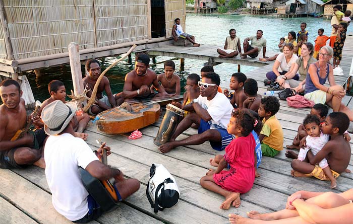 Visitors enjoy a sunset jam at Sawinggrai (Photo courtesy Robben Sauyai)