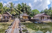 Family bungalow at right, May 2025<br /><i>Photo: Yusril Munawir/PERJAMPAT</i>